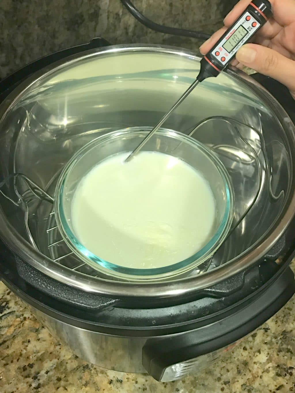 getting the temperature of yogurt in a bowl inside the instant pot