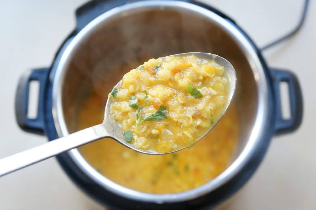 Indian Day Fry in a ladle on top of instant pot 