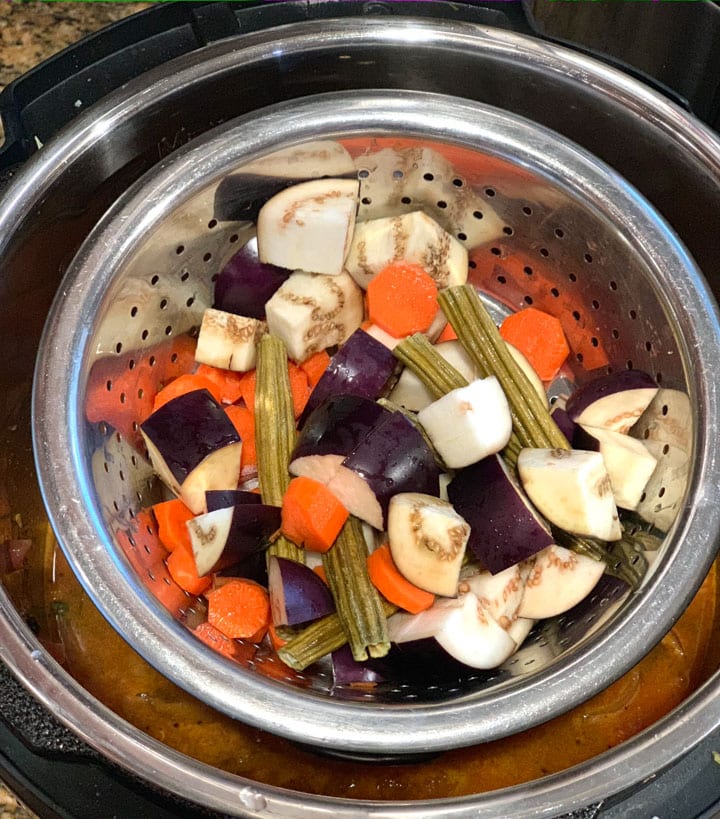 pot-input veggies being cooked in instant pot