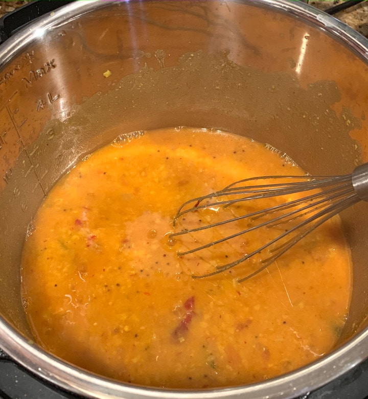 Sambar (lentil soup) in the instant pot along with a whisk