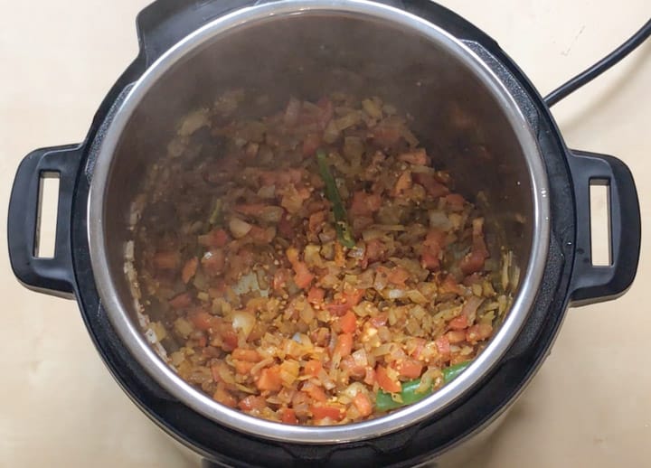Red Kidney Beans Curry. Rajma Instant Pot - Piping Pot Curry-7 Sautéed spices, onion and tomatoes to make instant pot rajma.
