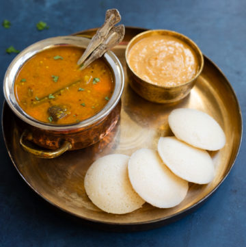 Idli served with sambar and chutney