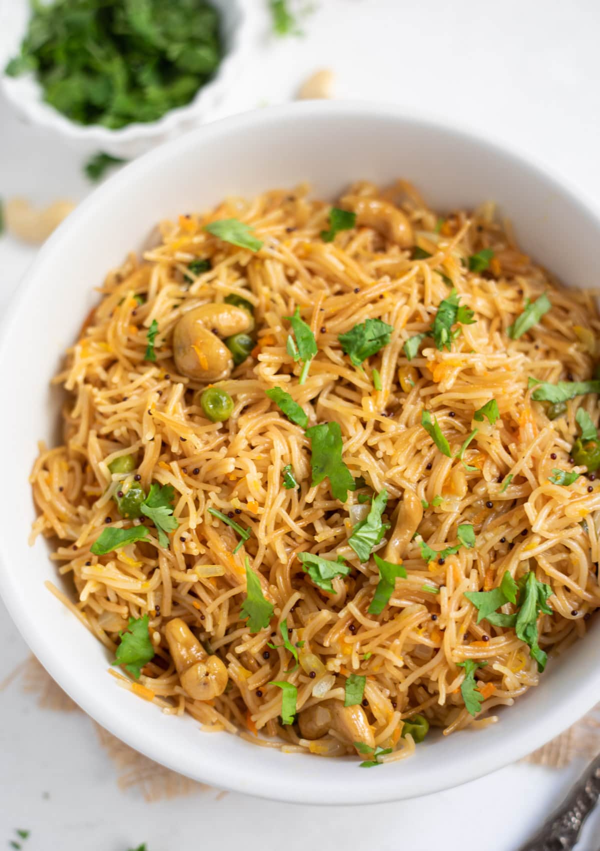 Semiya Upma made with vermicelli noodles in a bowl garnished with cilantro