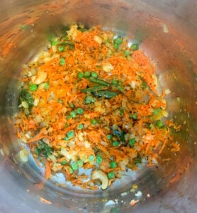 grated carrots, peas and onions in the instant pot