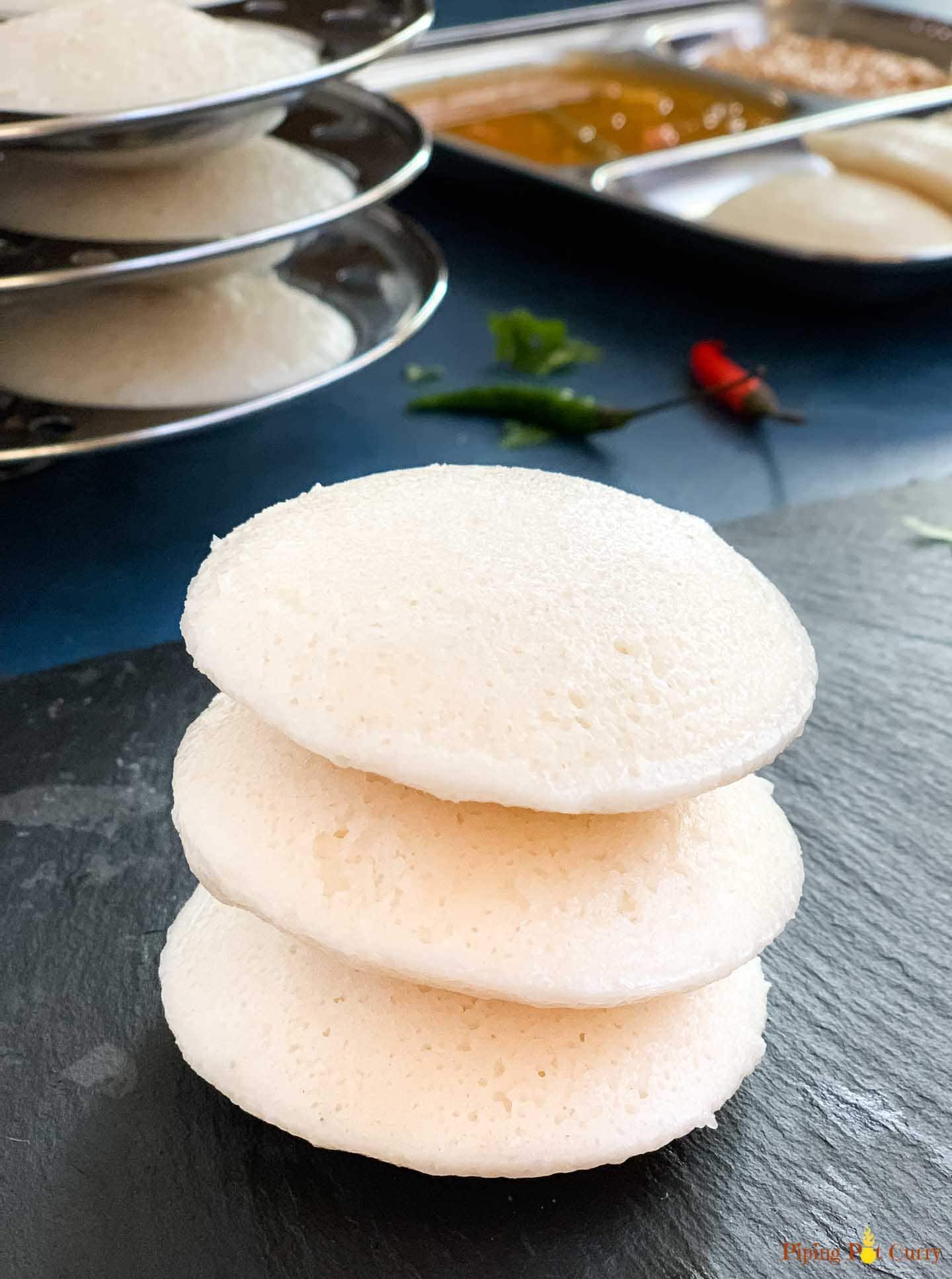 A stack of 3 fluffy spongy idli's