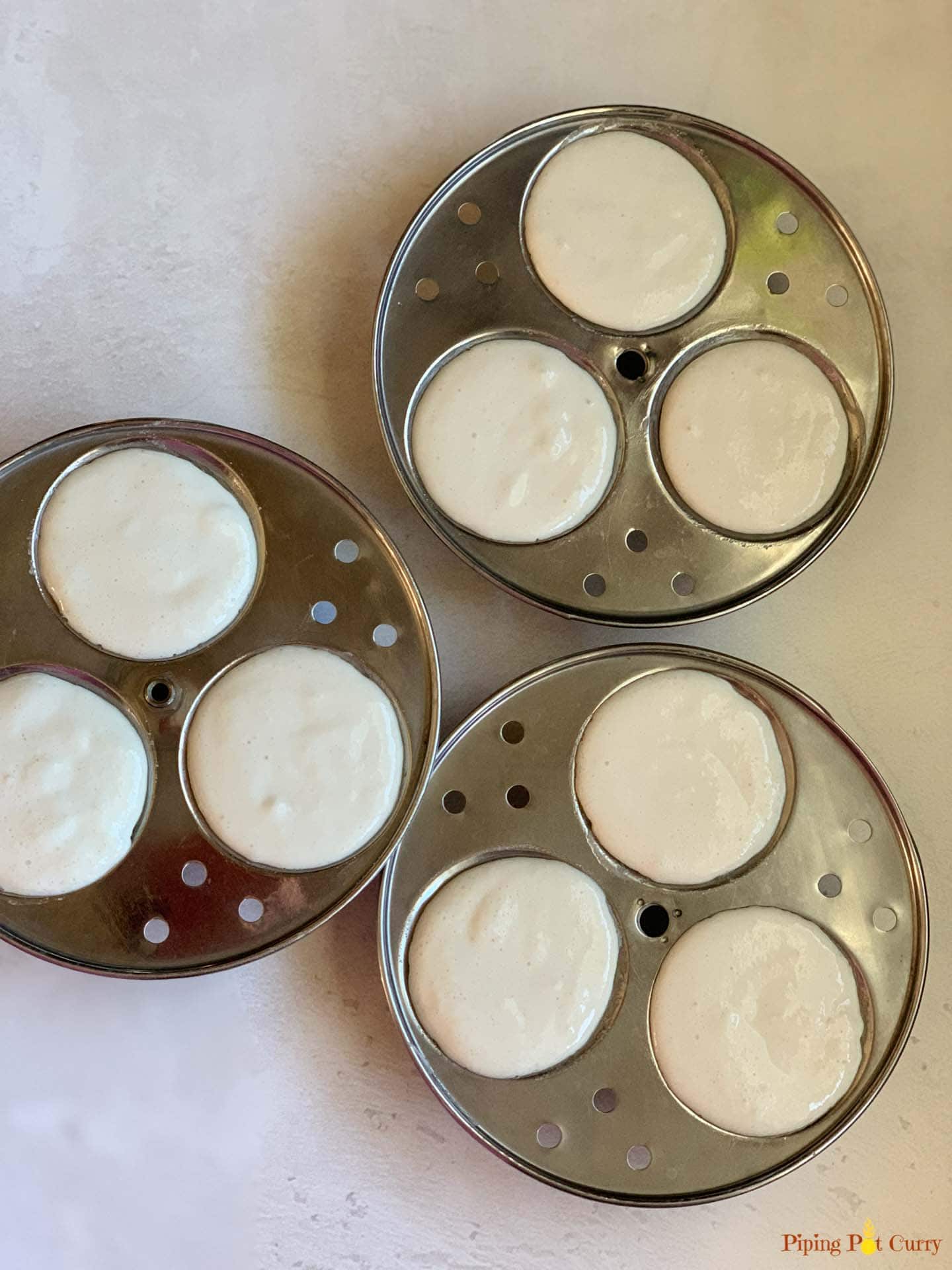 Idli batter in molds