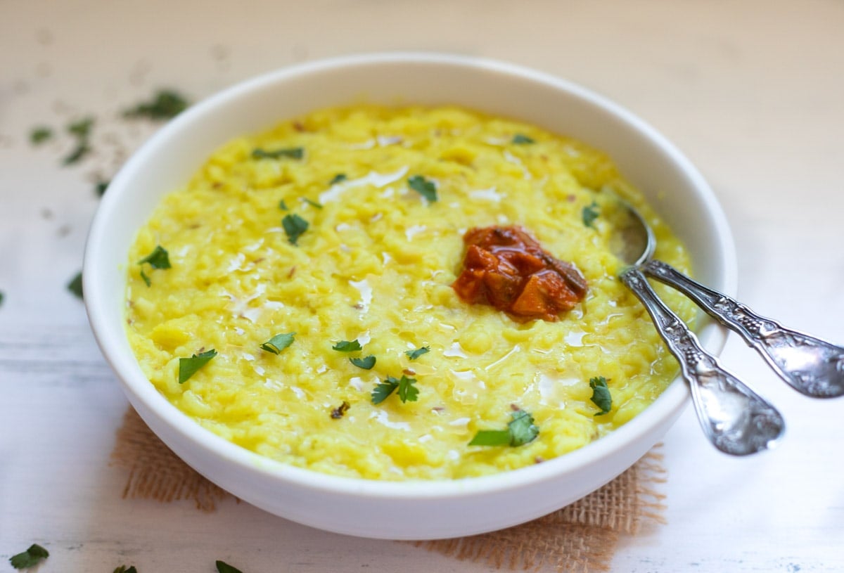 Simple comforting Kitchari made with lentils and rice served in a bowl 