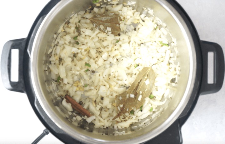 Chole Recipe Step 2 Chole Recipe Step 2 - Add onions in pressure cooker