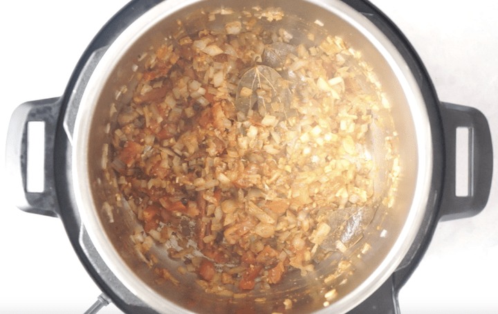 Chole Recipe Step 3 Chole Recipe Step 3 - Add tomatoes and spices in pressure cooker