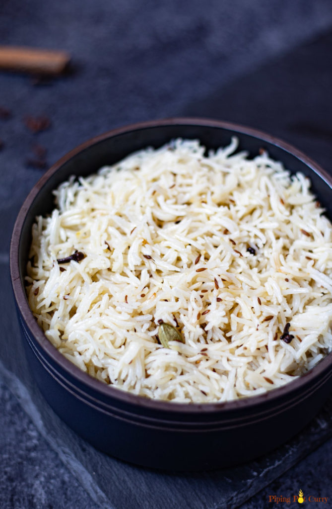 Cumin Rice in a black bowl