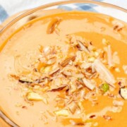 close up shot of carrot kheer in a bowl