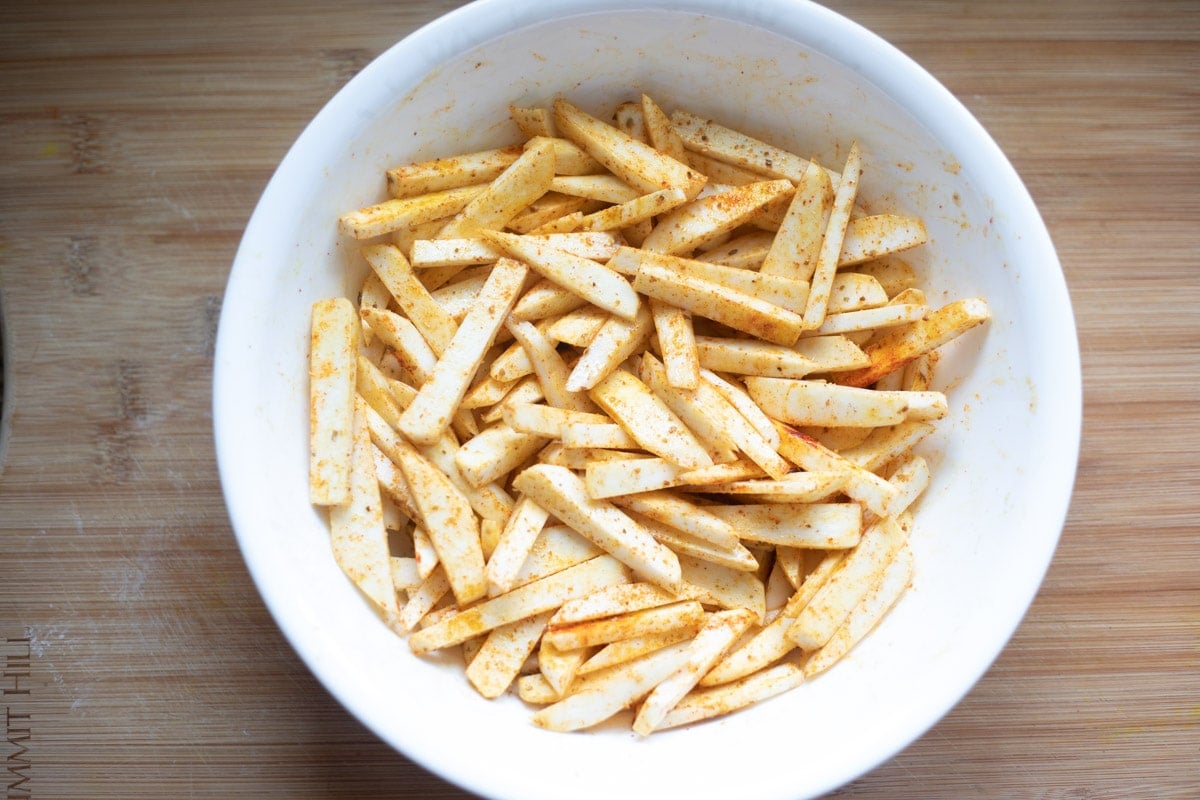 Taro fries covered with spices and oil