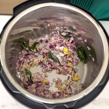 Saute onions to make chettinad chicken
