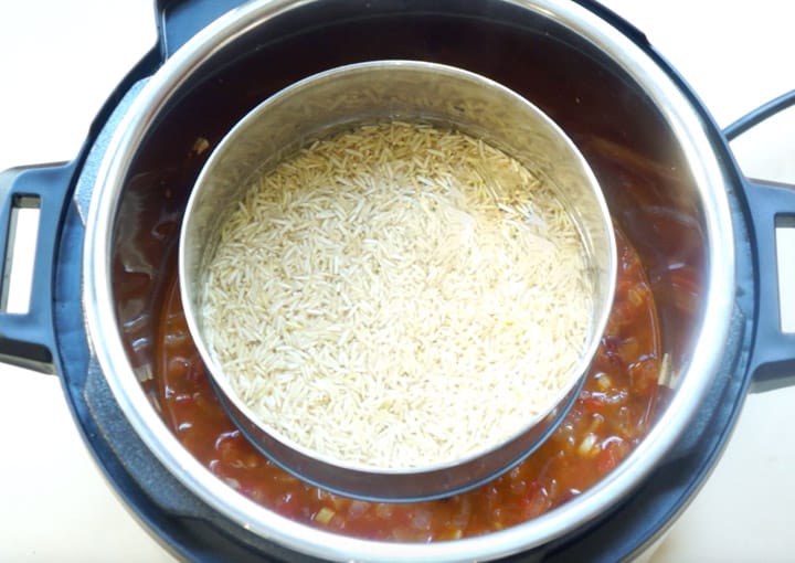 Dal Makhani Instant Pot - Piping Pot Curry-6 Dal Makhani being cooked with pot-in-pot brown rice in pressure cooker