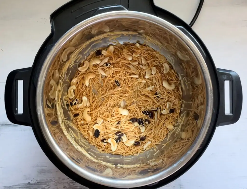 Roasted vermicelli with nuts and raisins ready to cook 