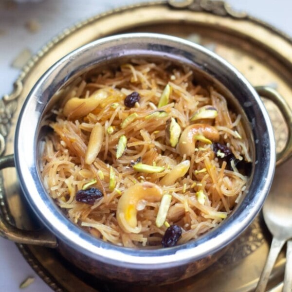 Dry Sweet Vermicelli Seviyan in a pretty bowl garnished with nuts and raisins
