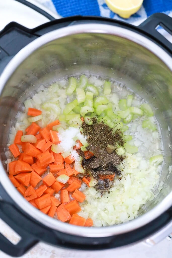 Saute onions carrots celery to make soup in instant pot