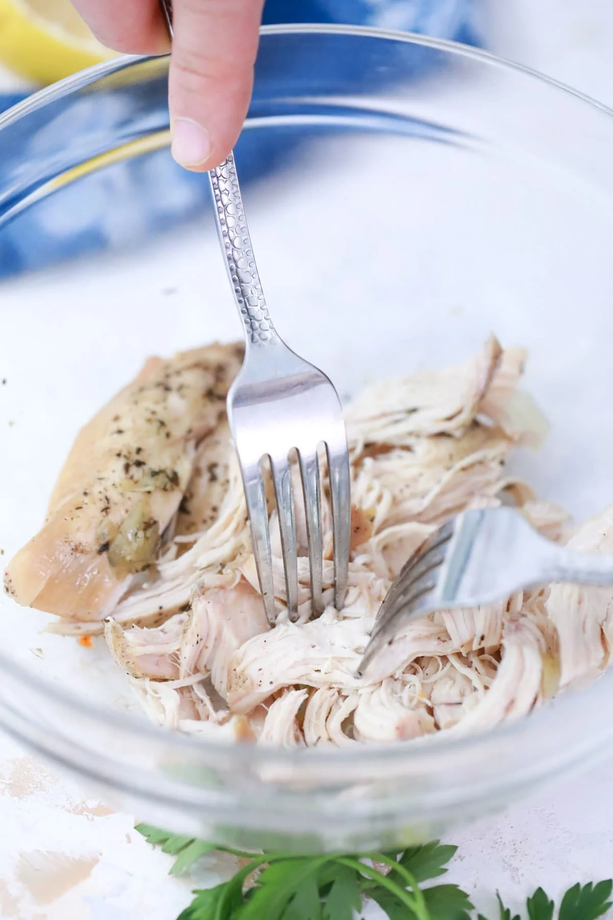 Shredding chicken with a fork