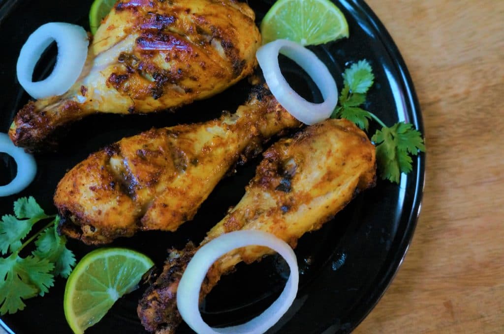 A flavor packed spicy dish from the Indian subcontinent popular all over the world. Chicken is marinated in yogurt, ginger, garlic, spices and lemon juice, then grilled in the air fryer or oven.