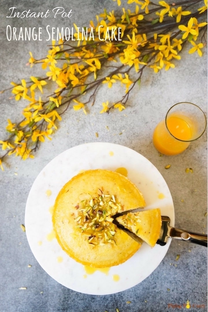 Semolina Cake / Rava Cake topped with orange syrup made in Instant Pot or Pressure Cooker. An easy to make, fluffy and moist cake with the gorgeous orange flavor. This is a egg free cake perfect for vegetarians | #cake #semolinacake #farina #orangecake #revani #basbousa | pipingpotcurry.com