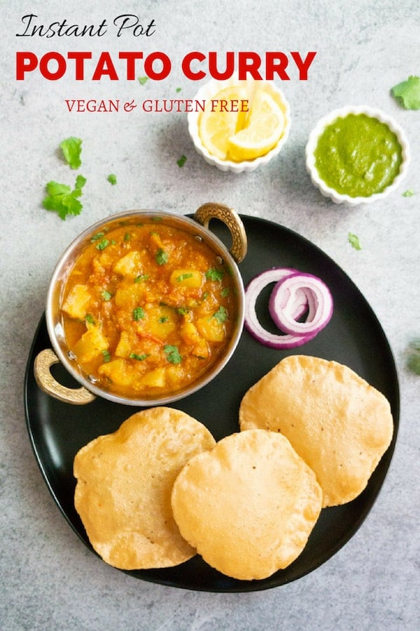 Easy and comforting Vegan Potato Curry in Tomato Gravy made in the Instant Pot. This North Indian Potato Curry is popularly known as Aloo Rasedar | #potato #curry #aloo #indian #tomato #vegan #glutenfree #instantpot #vegetarian #pressurecooker #spicy | pipingpotcurry.com