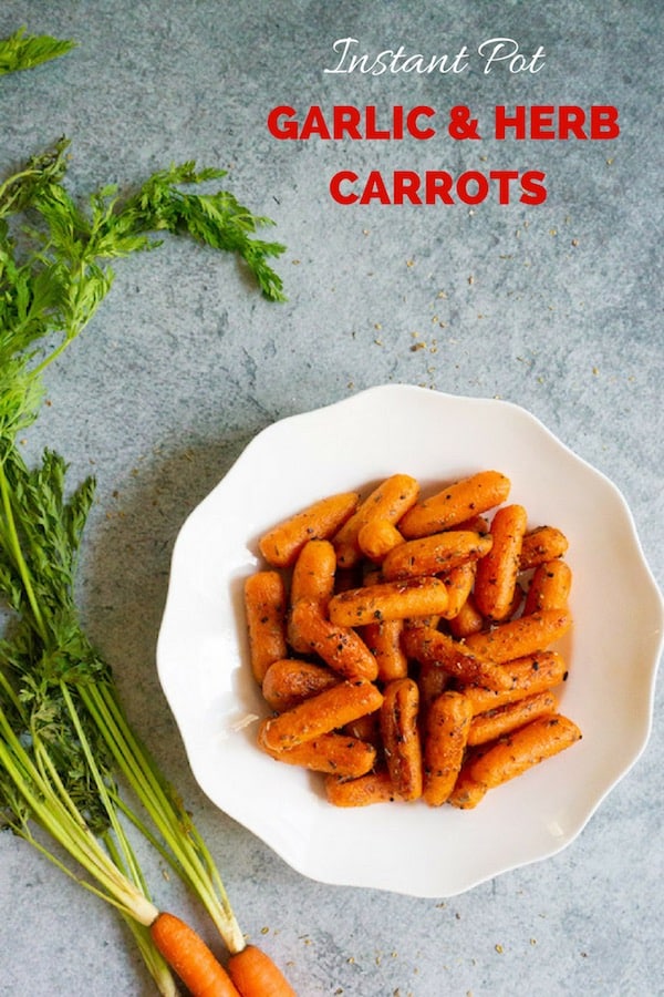 Garlic & Herb Carrots are cooked to perfection in the Instant Pot or Pressure Cooker. Sautéed with lots of butter, garlic and herbs, they make a perfect side dish! #instantpot #pressurecooker #carrots #side #garlic #babycarrots | pipingpotcurry.com
