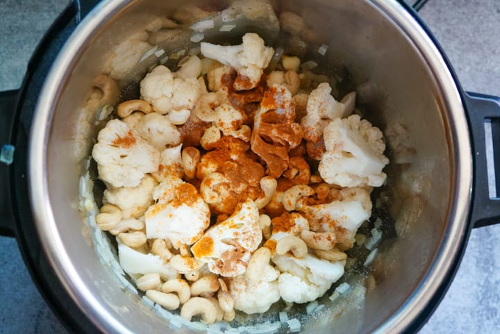 Onions, Cauliflower, Cashews and Spices in Instant Pot to make Turmeric Cauliflower Soup