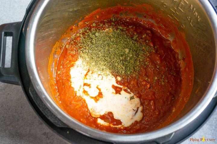 Instant Pot Salmon Tikka Masala -Step 4: Add cream and dried fenugreek leaves