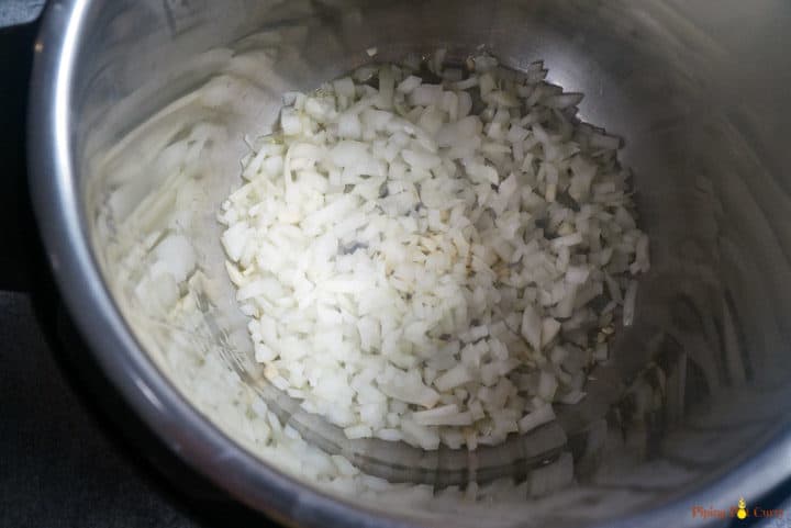 Pressure Cooker Cream of Broccoli Soup - Step 1 saute onions Pressure Cooker Cream of Broccoli Soup - Step 1 saute onions