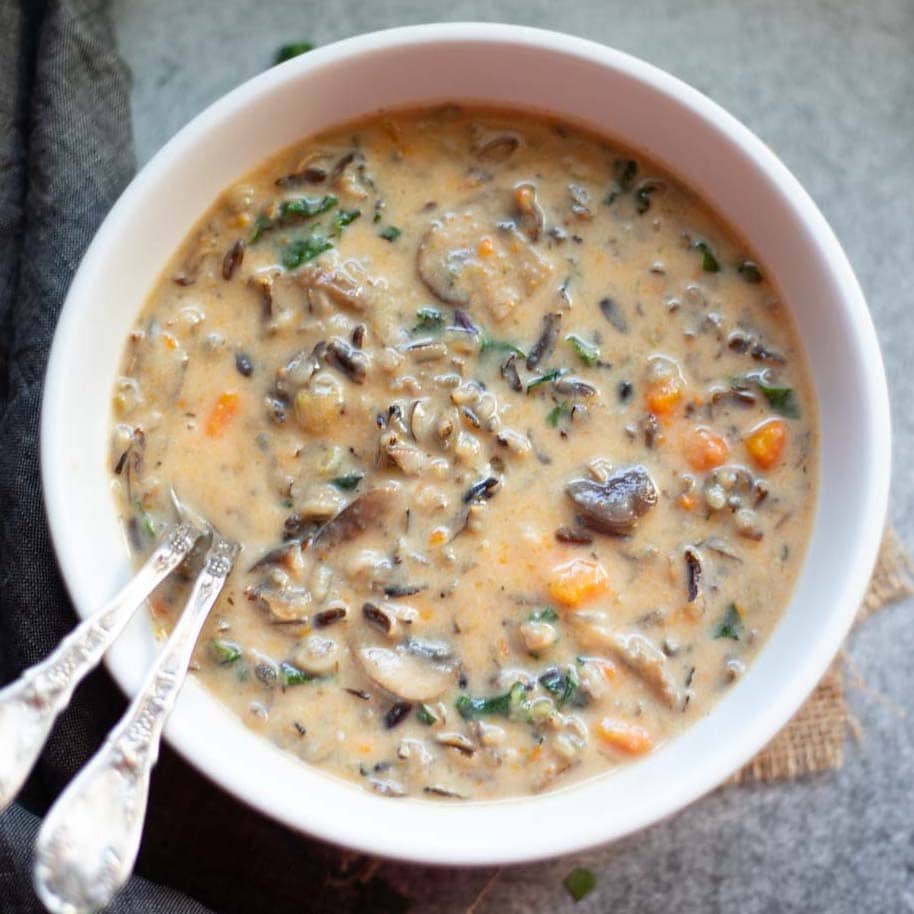 Mushroom wild rice soup in a white bowl