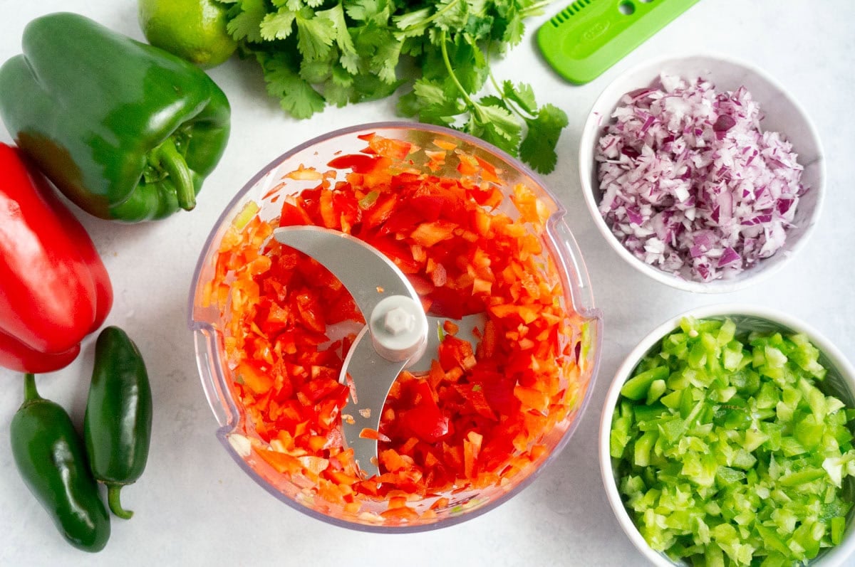 Chopping red bell peppers