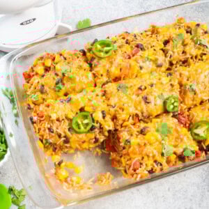 Vegetarian Mexican Casserole with rice and beans topped with cheese and jalapenos