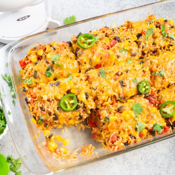 Vegetarian Mexican Casserole with rice and beans topped with cheese and jalapenos