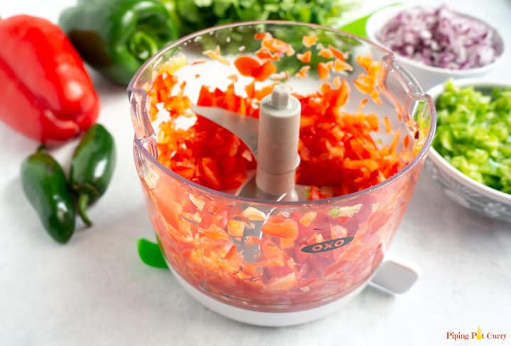 Vegetarian Mexican Casserole with Rice & Beans - Chop red bell pepper in OXO manual chopper