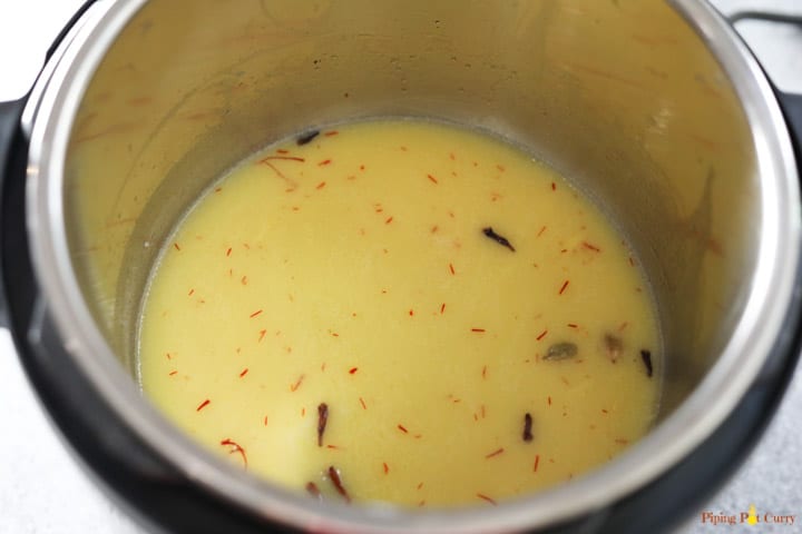 Zarda. Meethe Chawal - Add water, saffron, sugar in Instant Pot