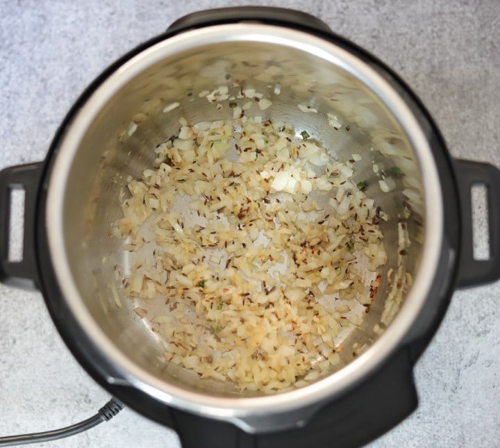 Whole Masoor Dal in Instant Pot Step 1 Sauté onions