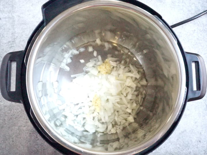Paneer Tikka Masala in Instant Pot - 5. Saute onions Saute onions to make Paneer tikka masala in instant pot