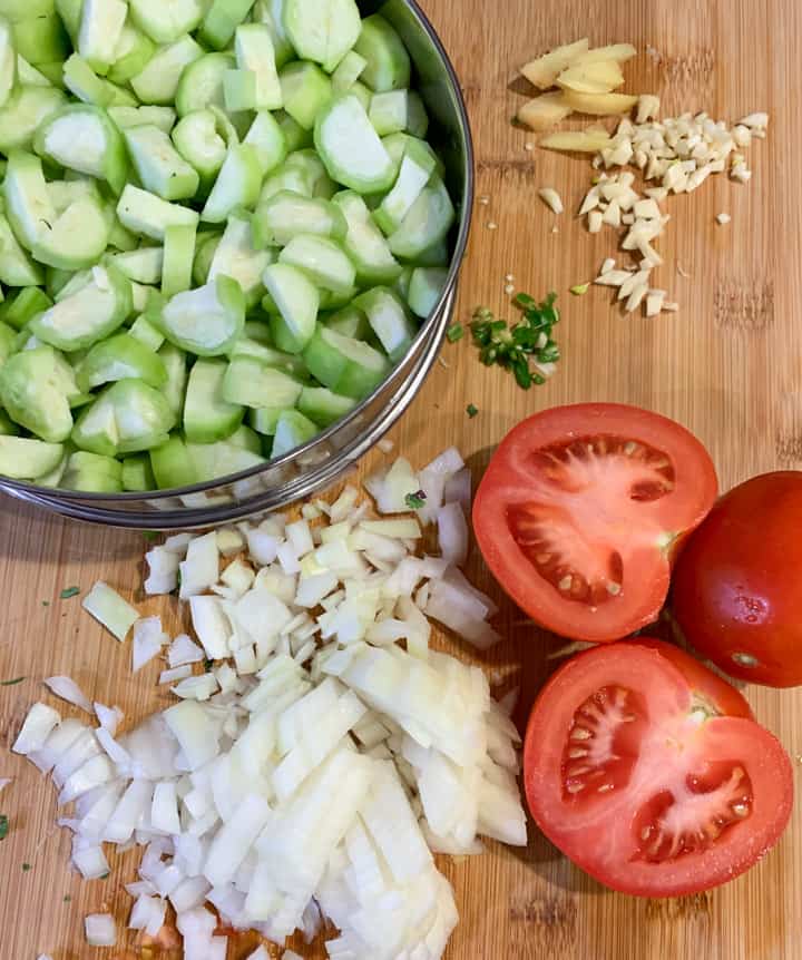 Ingredients to make ridge gourd curry or Turai ki subzi