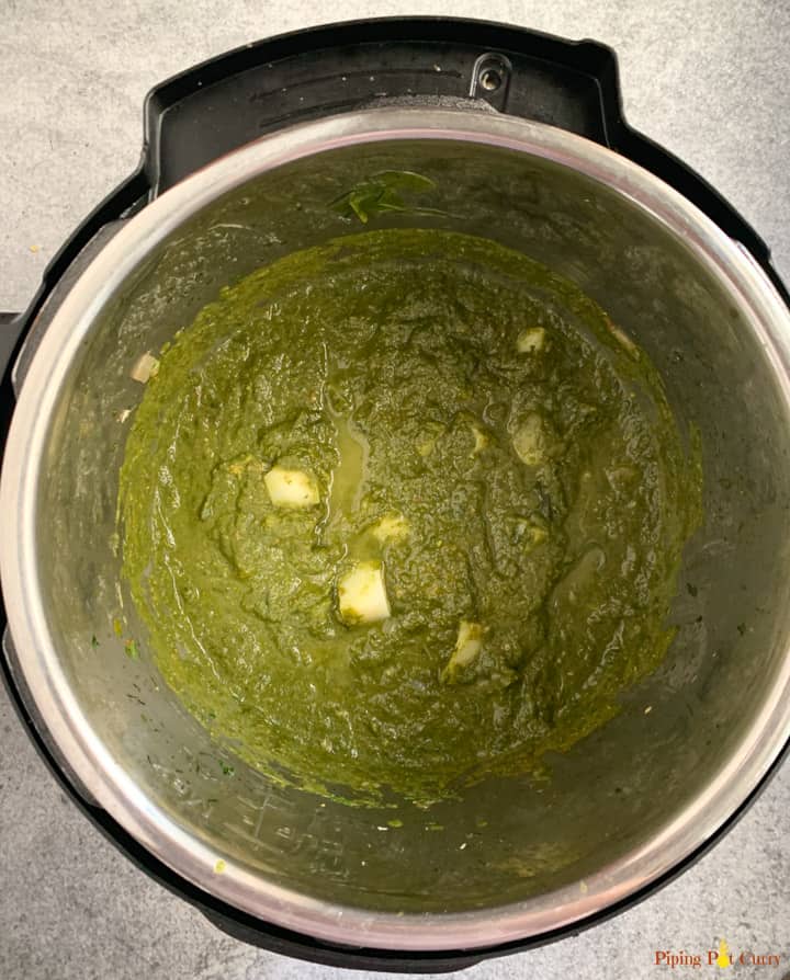 Potatoes in pureed spinach curry in the instant pot