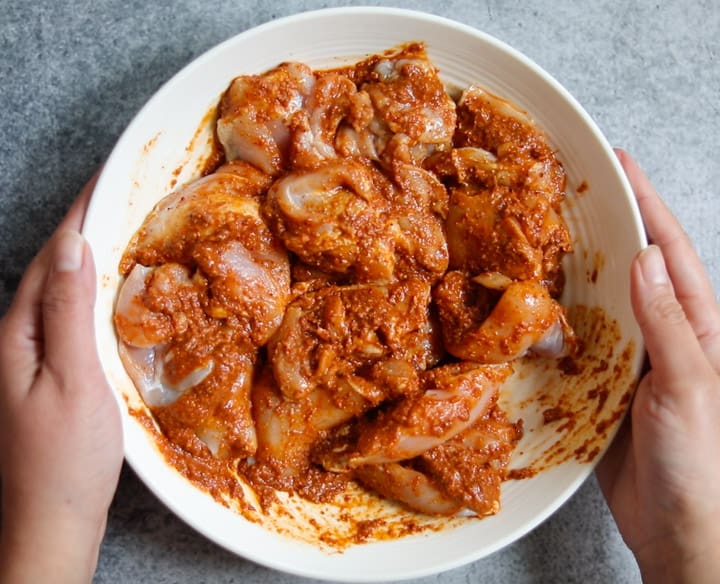 Chicken Vindaloo in Instant Pot - Piping Pot Curry-12 Cubed Chicken thighs coated with vindaloo curry sauce to make chicken vindaloo