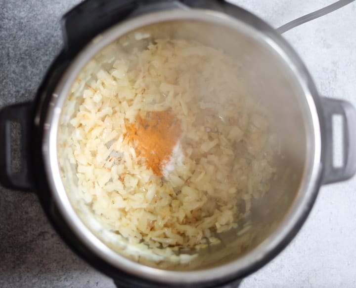 Chicken Vindaloo in Instant Pot - Piping Pot Curry-13 Saute onions in instant pot to make chicken vindaloo curry