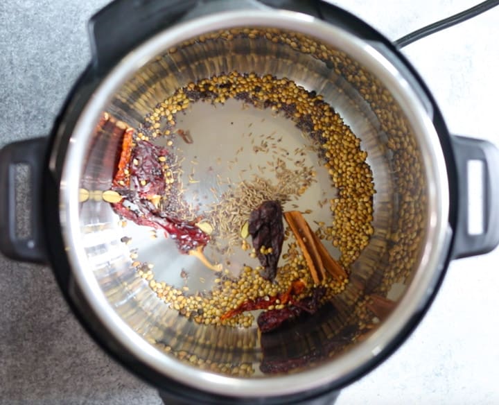 Chicken Vindaloo in Instant Pot - Piping Pot Curry-9 Roasting whole spices in the instant pot to make chicken vindaloo