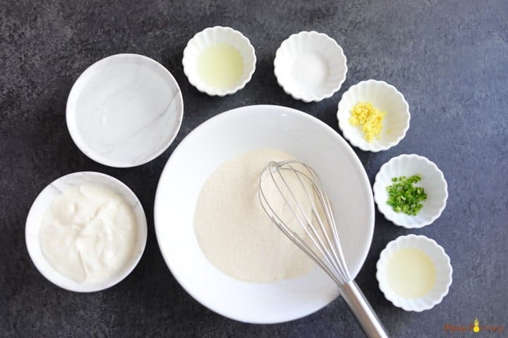 Ingredients to make Rava Dhokla in bowls 