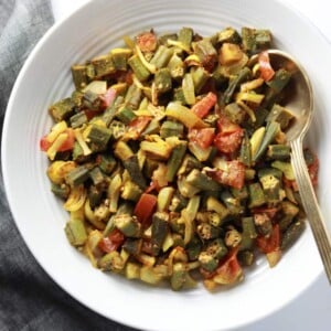 Baked Bhindi or Oven roasted okra in a white bowl