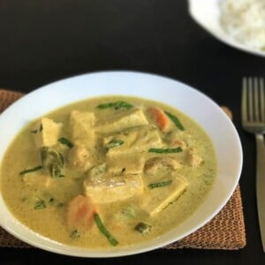 Thai Green curry served in a white bowl