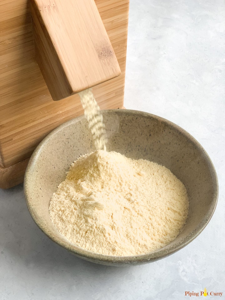 Chickpea flour coming of a stone mill 