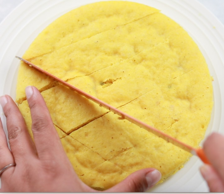 Khaman instant pot steps - Piping Pot Curry-8 Cutting Khaman dhokla with a knife