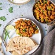 Aloo Gajar Matar served with roti and salad