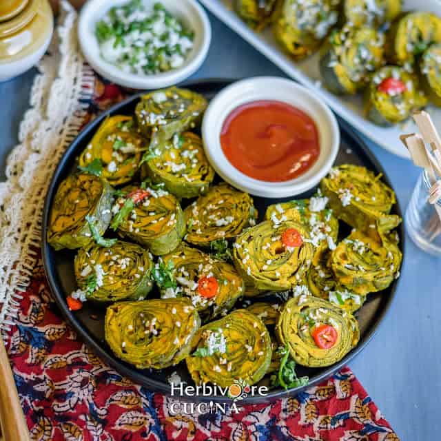 Patra Steamed Colocasia rolls along with ketchup to dip