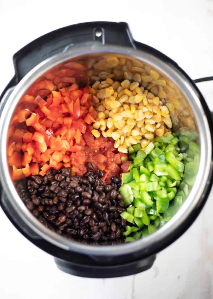 Vegetarian Taco Soup Instant Pot-2 Black Beans, Bell Peppers, Corn and Tomatoes to make soup in the instant pot